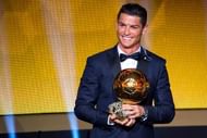 ZURICH, SWITZERLAND - JANUARY 12: Cristiano Ronaldo of Portugal and Real Madrid receives the 2014 FIFA Ballon d'Or award for the player of the year during the FIFA Ballon d'Or Gala 2014 at the Kongresshaus on January 12, 2015 in Zurich, Switzerland. (Photo by Philipp Schmidli/Getty Images)